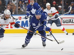 Claude Giroux of the Florida Panthers skates to check Maple Leafs' Mitch Marner at Scotiabank Arena on Sunday, March 27, 2022.