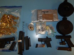 An image released by Toronto Police of items seized during search warrants that led to the arrest of Bryan Taylor, 36, on March 8, 2022.