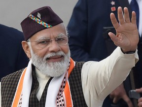 'APPEARANCE OF A REPRISAL': Indian officials probe BBC for third day, alleging tax dodge India’s Prime Minister Narendra Modi waves towards the crowd as he leaves after the Republic Day parade in New Delhi, Jan. 26, 2022.