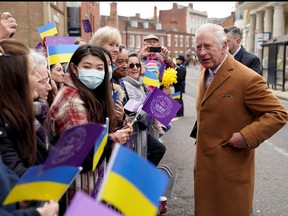Prince Charles meets members of the public during a visit to Winchester, Britain to view the recently unveiled statue of Licoricia of Winchester and to officially open The Arc, March 3, 2022.