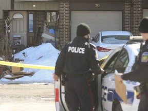 Peel Regional Police at the scene after a 28-year-old man was shot dead at a townhouse complex off of Formentera Ave. and Aquitaine Ave. in Mississauga on Wednesday, March 2, 2022.