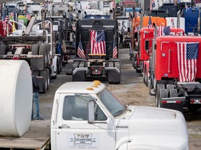 Trucks belonging to participants of the Peoples Convoy sit at the Hagerstown Speedway in Hagerstown, Maryland, Saturday, March 5, 2022.