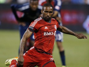 Jermain Defoe scores on a penalty kick as TFC takes on Vancouver Whitecaps FC at BMO Field on July 16, 2014.