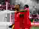 Canada's Cyle Larin (17) celebrates scoring a goal with Richie Laryea (22) in a FIFA World Cup qualifying game against Jamaica at BMO Field in Toronto, Ont., on March 27, 2022.  