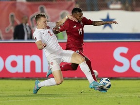 Panama's Alberto Quintero in action with Canada's Alistair Johnston at the Estadio Rommel Fernandez, in Panama City, Panama on March 30, 2022.