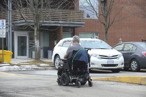 Residents pop outside Lakeside Long-Term Care Centre in Parkdale, on Dunn Ave. for some fresh air on Monday, March 14, 2022. JACK BOLAND/TORONTO SUN