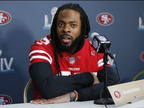 Richard Sherman of the San Francisco 49ers speaks to the media during the San Francisco 49ers media availability prior to Super Bowl LIV at the James L. Knight Center on Jan. 30, 2020 in Miami, Fla.