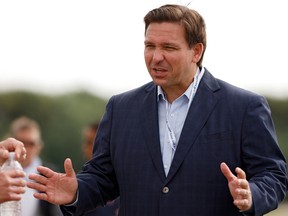 Florida governor Ron DeSantis meets with fans during Day One of The Walker Cup at Seminole Golf Club on May 8, 2021 in Juno Beach, Florida.
