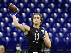 Kenny Pickett of Pittsburgh throws during the NFL Combine at Lucas Oil Stadium on March 3, 2022 in Indianapolis, Indiana.