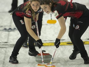 Canada second 
Shannon Birchard (right) and lead Briane Meilleur sweep during their team's win over Italy to open the world women's curling championship in Prince George, B.C. on March 19, 2022.