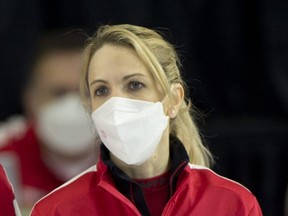 Switzeralnd skip Silvana Tirinzoni wears a mask during her team's game against Japan at the world women's curling championship in Prince George, B.C., on March 25, 2022. As a result of positive COVID tests, Japan played the game with only three players, and dropped out of the event later in the day.
