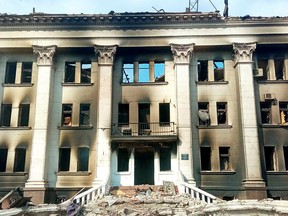 General view of the remains of the drama theatre which was hit by a bomb when hundreds of people were sheltering inside in Mariupol, Ukraine, in this handout picture released March 18, 2022.
