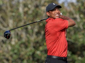Tiger Woods plays a shot during the final round of the PNC Championship at the Ritz Carlton Golf Club Grande Lakes on December 19, 2021 in Orlando, Florida.