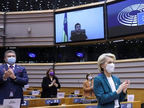 President of the European Commission, Ursula Von Der Leyen, applauds after Ukrainian President Volodymyr Zelenskiy's speech at the European Parliament special session to debate its response to the Russian invasion of Ukraine, in Brussels, Belgium March 1, 2022.