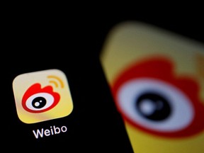 The logo of Chinese social media app Weibo is seen on a mobile phone in this illustration picture taken Dec. 7, 2021.