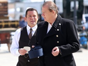 Yannick Bisson, left, in a scene from Murdoch Mysteries being filmed at Springer Market Square in Kingston, Ont. on June 2, 2021.