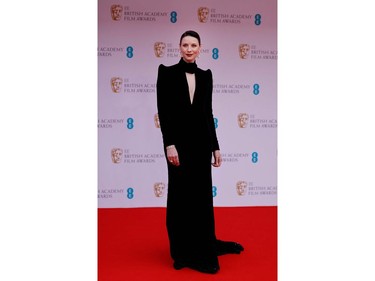 Irish actress Caitriona Balfe poses on the red carpet upon arrival at the BAFTA British Academy Film Awards at the Royal Albert Hall, in London, on March 13, 2022.