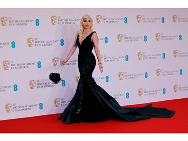 U.S. actress and singer Lady Gaga poses on the red carpet upon arrival at the BAFTA British Academy Film Awards at the Royal Albert Hall, in London, on March 13, 2022.
