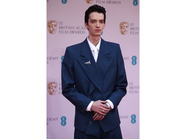 Kodi Smit-McPhee arrives at the 75th British Academy of Film and Television Awards (BAFTA) at the Royal Albert Hall in London, March 13, 2022.