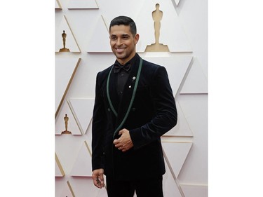 Wilmer Valderrama poses on the red carpet during the Oscars arrivals at the 94th Academy Awards in Hollywood, Los Angeles, Calif., March 27, 2022.