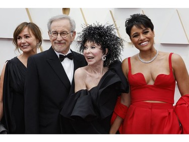 Kristie Macosko Krieger, Steven Spielberg, Rita Moreno and Ariana DeBose pose on the red carpet during the Oscars arrivals at the 94th Academy Awards in Hollywood, Los Angeles, Calif., March 27, 2022.