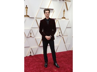 Andrew Garfield poses on the red carpet during the Oscars arrivals at the 94th Academy Awards in Hollywood, Los Angeles, Calif., March 27, 2022.