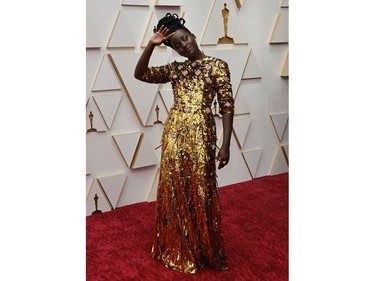 Lupita Nyong'o poses on the red carpet during the Oscars arrivals at the 94th Academy Awards in Hollywood, Los Angeles, Calif., March 27, 2022.