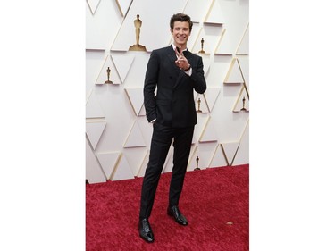 Shawn Mendes poses on the red carpet during the Oscars arrivals at the 94th Academy Awards in Hollywood, Los Angeles, Calif., March 27, 2022.