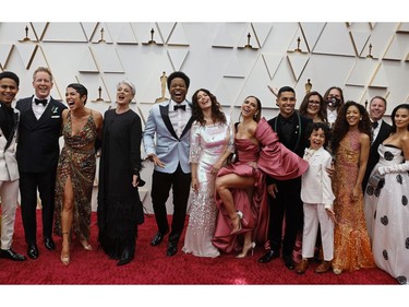 Cast of Encanto pose on the red carpet during the Oscars arrivals at the 94th Academy Awards in Hollywood, Los Angeles, Calif., March 27, 2022.