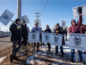 Teamsters Canada Rail Conference members are pictured at a picket line in Edmonton on March 21, 2022.