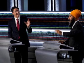 In this file photo, Prime Minister Justin Trudeau and NDP Leader Jagmeet Singh are pictured at a  federal election English-language  debate in Gatineau, Que.
