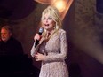 Dolly Parton performs "9 to 5" at the Billboard Women in Music event in December 2020.