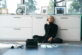 Amanda Seyfried as Elizabeth Holmes in The Dropout.