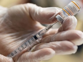 A vaccinator draws a Pfizer-BioNTech coronavirus disease (COVID-19) pediatric vaccine in Lansdale, Pennsylvania, U.S., December 5, 2021.