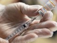 A vaccinator draws a Pfizer-BioNTech COVID-19 pediatric vaccine in Lansdale, Pa., Dec. 5, 2021.