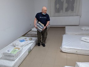 Retired firefighter Jack Turner helping Ukrainian refugees in Romania in March 2022.