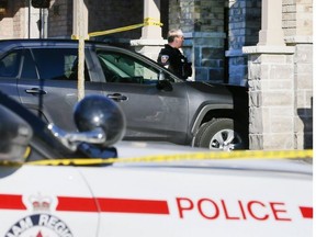 Police investigate after a man was shot in a brazen daylight shooting at a Pickering townhouse on Sunday., March 6, 2022.