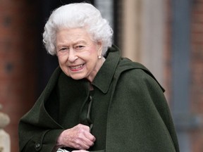 Queen Elizabeth II smiles as she leaves Sandringham House 2022 - Getty