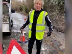 Rod Stewart is seen fixing potholes in England in a video posted on his Instagram account.