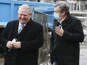 Premier Doug Ford (left) and Mayor John Tory are pictured at the ground-breaking ceremony for the Ontario Line in March 2022.