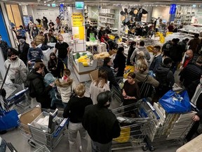 Customers queue in IKEA store, in Moscow, Russia, March 3, 2022.