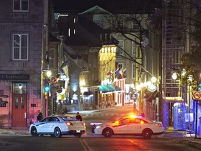 Police cars block St. Louis Street near the Chateau Frontenac in Quebec City, Nov. 1, 2020.