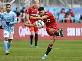 Toronto FC midfielder Jonathan Osorio (21) sends a pass against New York City FC.