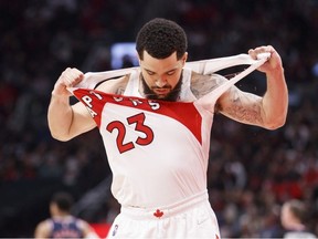 Fred VanVleet of the Toronto Raptors rips his jersey during the first half of Game Four of the Eastern Conference First Round against the Philadelphia 76ers at Scotiabank Arena on April 23, 2022 in Toronto, Canada.