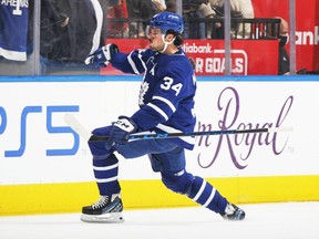 TORONTO, ON - APRIL 26: Auston Matthews #34 of the Toronto Maple Leafs celebrates his 60th goal of the season during an NHL game against the Detroit Red Wings at Scotiabank Arena on April 26, 2022 in Toronto, Ontario, Canada. The Maple Leafs defeated the Red Wings 3-0. (Photo by Claus Andersen/Getty Images)