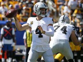 Quarterback Derek Carr of the Las Vegas Raiders passes the ball in the first half of the game against the Pittsburgh Steelers at Heinz Field on September 19, 2021 in Pittsburgh, Pennsylvania.