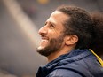 Colin Kaepernick interacts with fans during the Michigan spring football game at Michigan Stadium on April 2, 2022 in Ann Arbor, Michigan.  Kaepernick was honorary captain for the game.