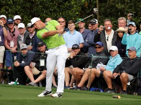 Bryson DeChambeau plays his shot from the 14th tee during a practice round at the Masters yesterday.