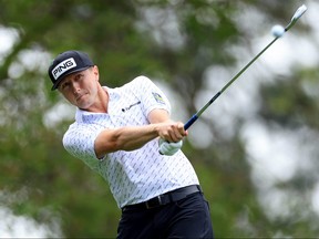 Mackenzie Hughes of Canada plays his shot from the fourth tee during the first round of the Masters at Augusta National Golf Club on Thursday.  Hughes finished the day at two over.