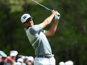 Corey Conners of Canada plays his shot from the 12th tee during the second round of The Masters at Augusta National Golf Club in Augusta.